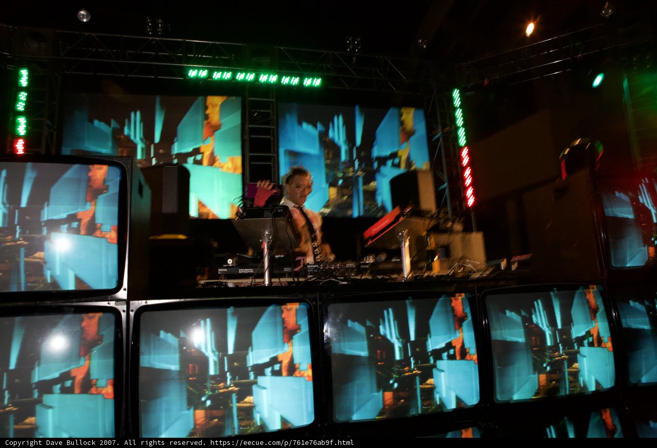Electronic Dance Concert with a DJ and Monitors