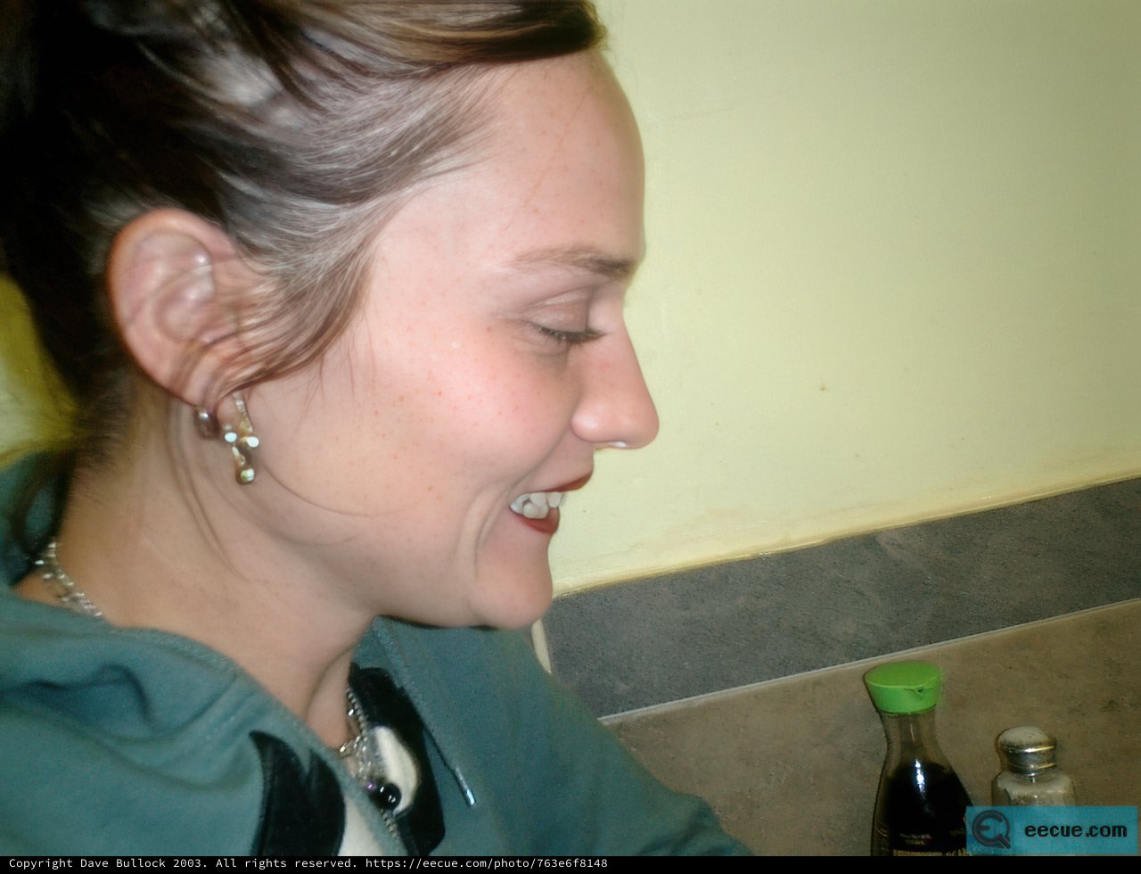 The Happy Woman with Three Necklaces