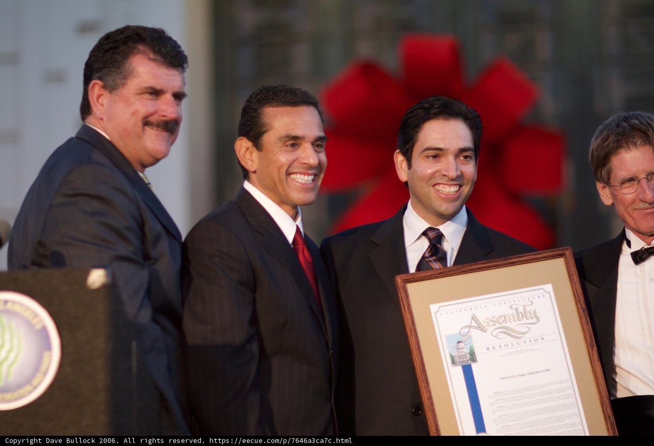 Four Men in Suits Celebrate Award with Antonio Villaraigosa