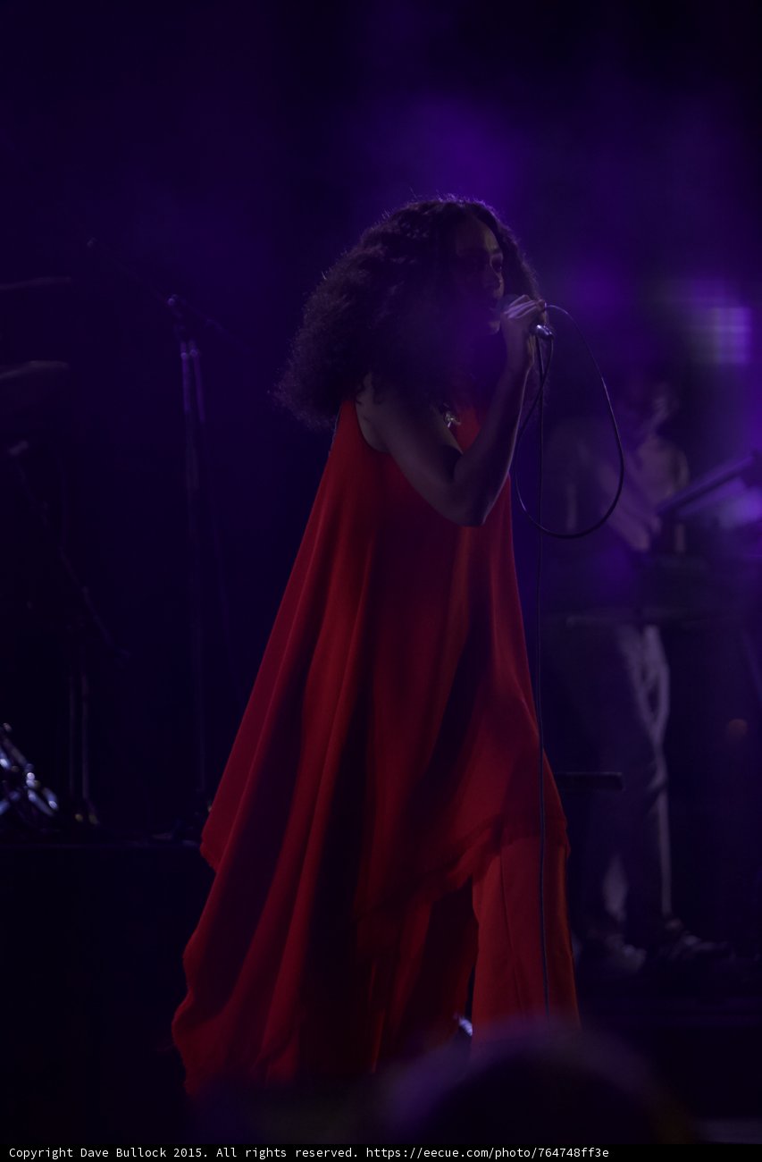 Solange Portrait Singing Red Dress Purple Light