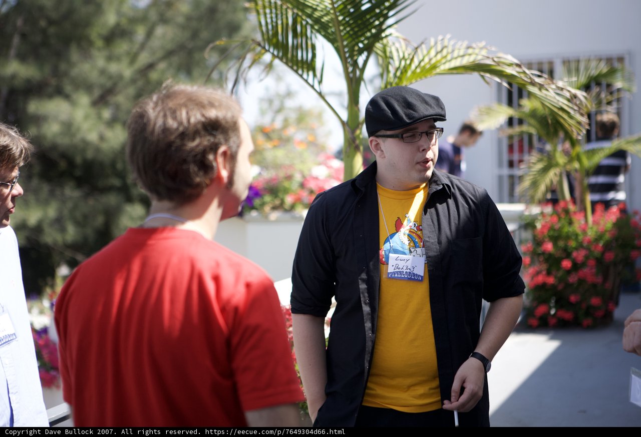 Yellow Shirt and Black Hat