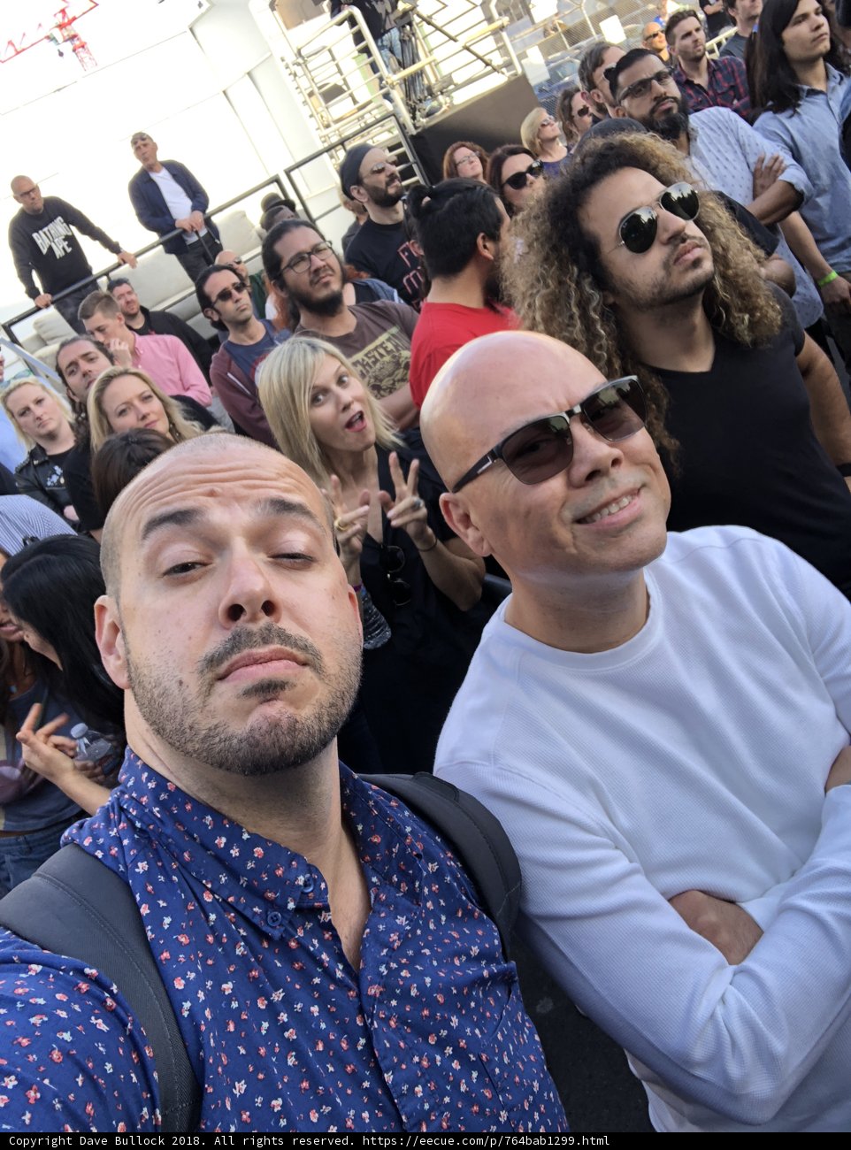 Two Men in Hats Take On the Crowd