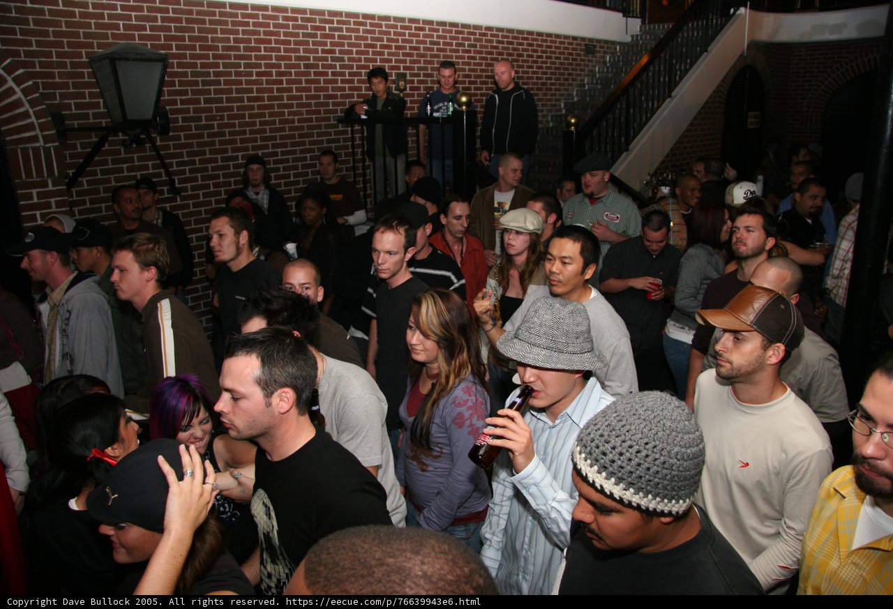 Partygoers Gather Around the Stage