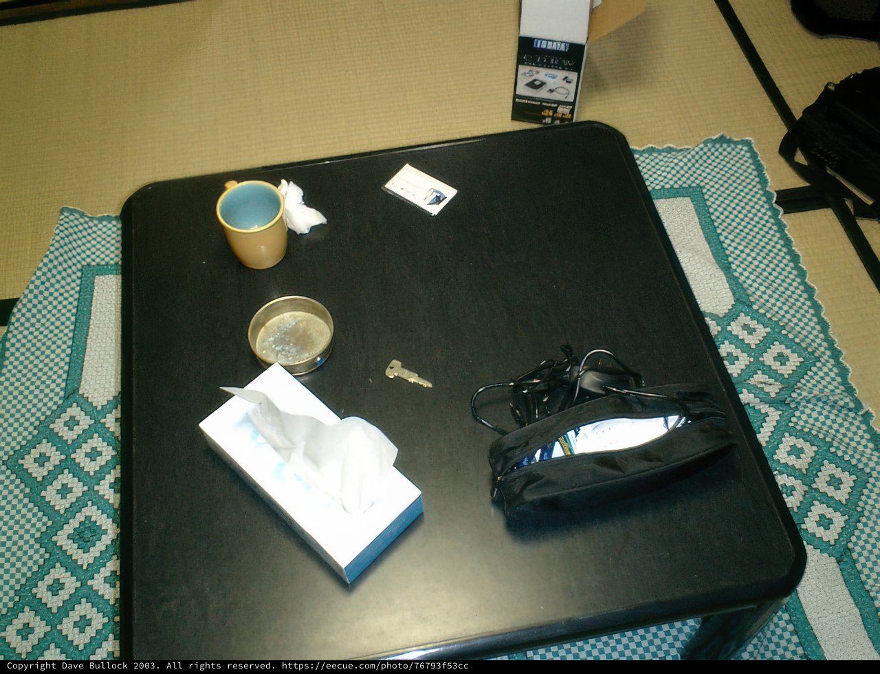 Sleek Black Coffee Table and Glasses