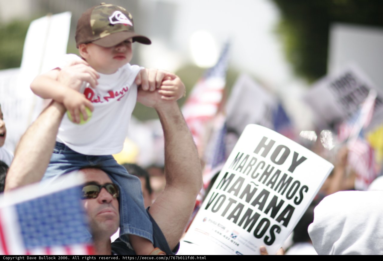 Father and Child with Protest Sign