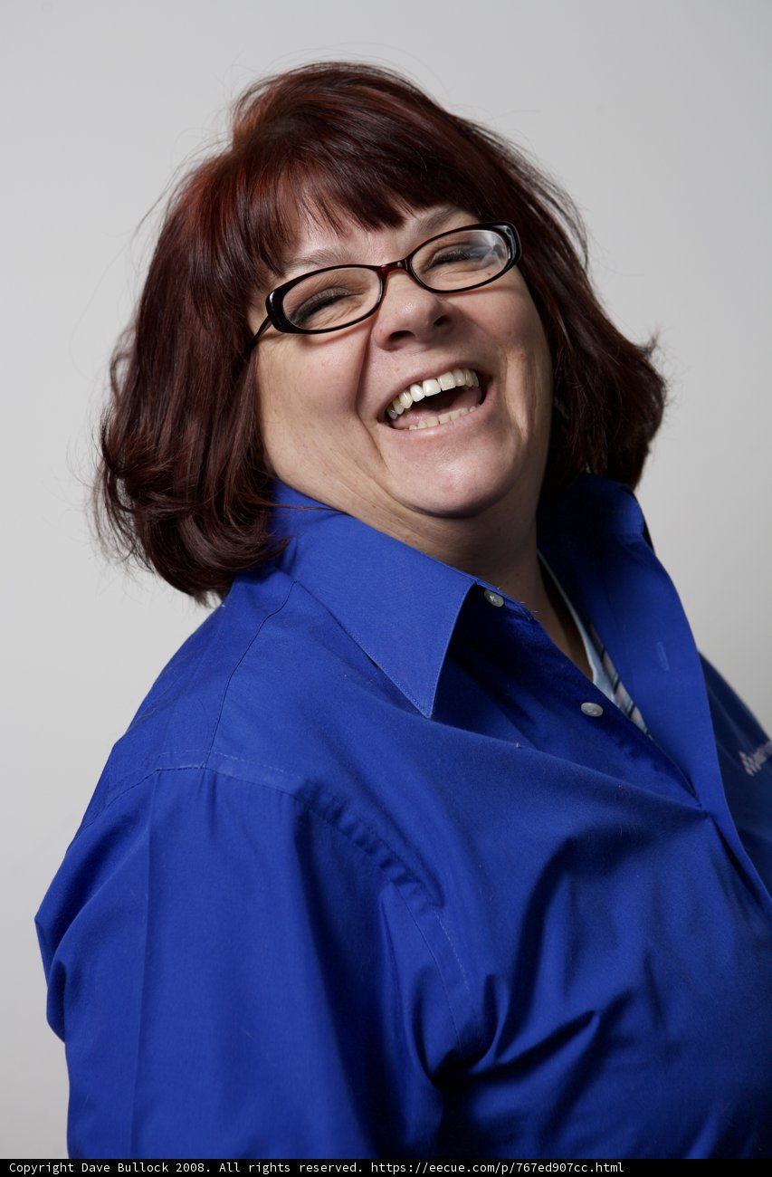 Happy Woman in Blue Glasses