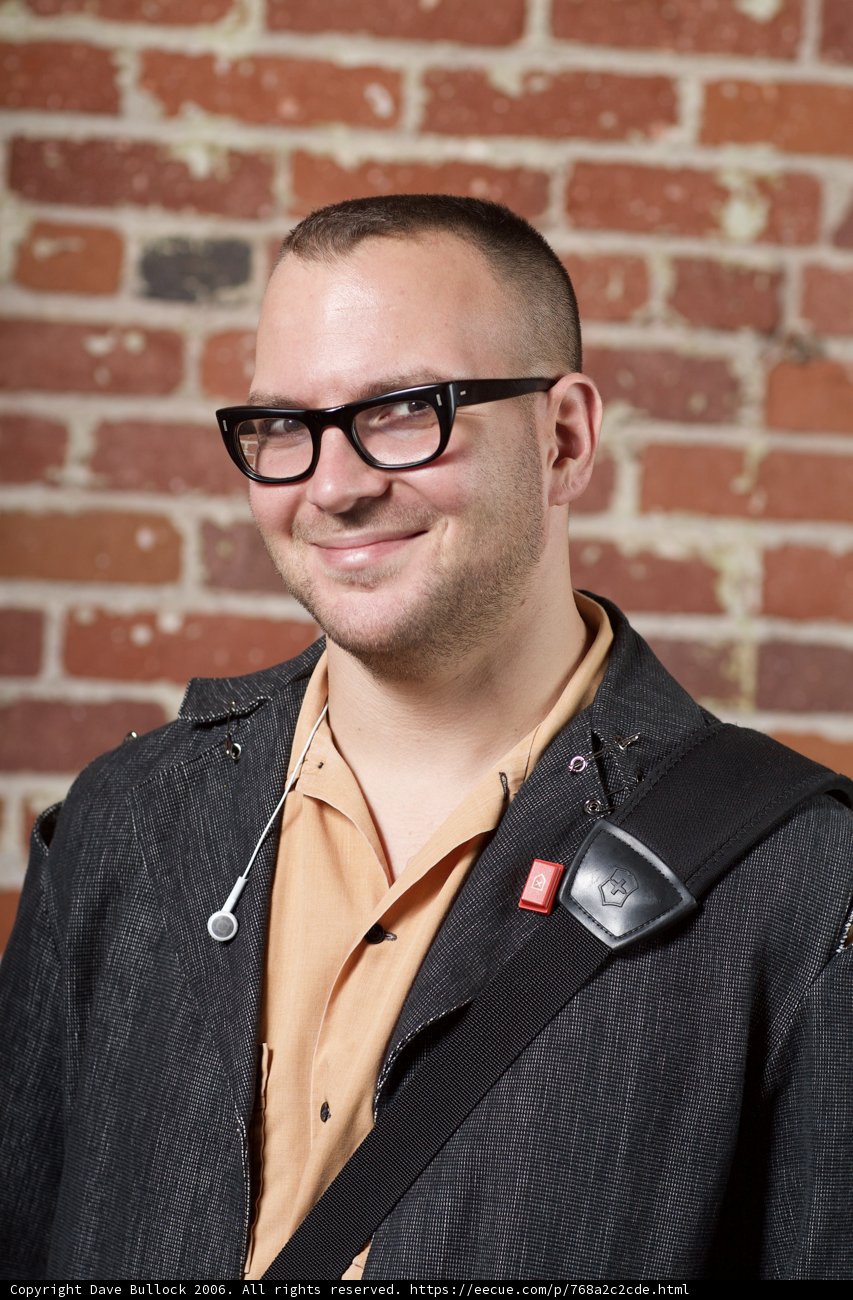 Stylish Man in Brick Setting