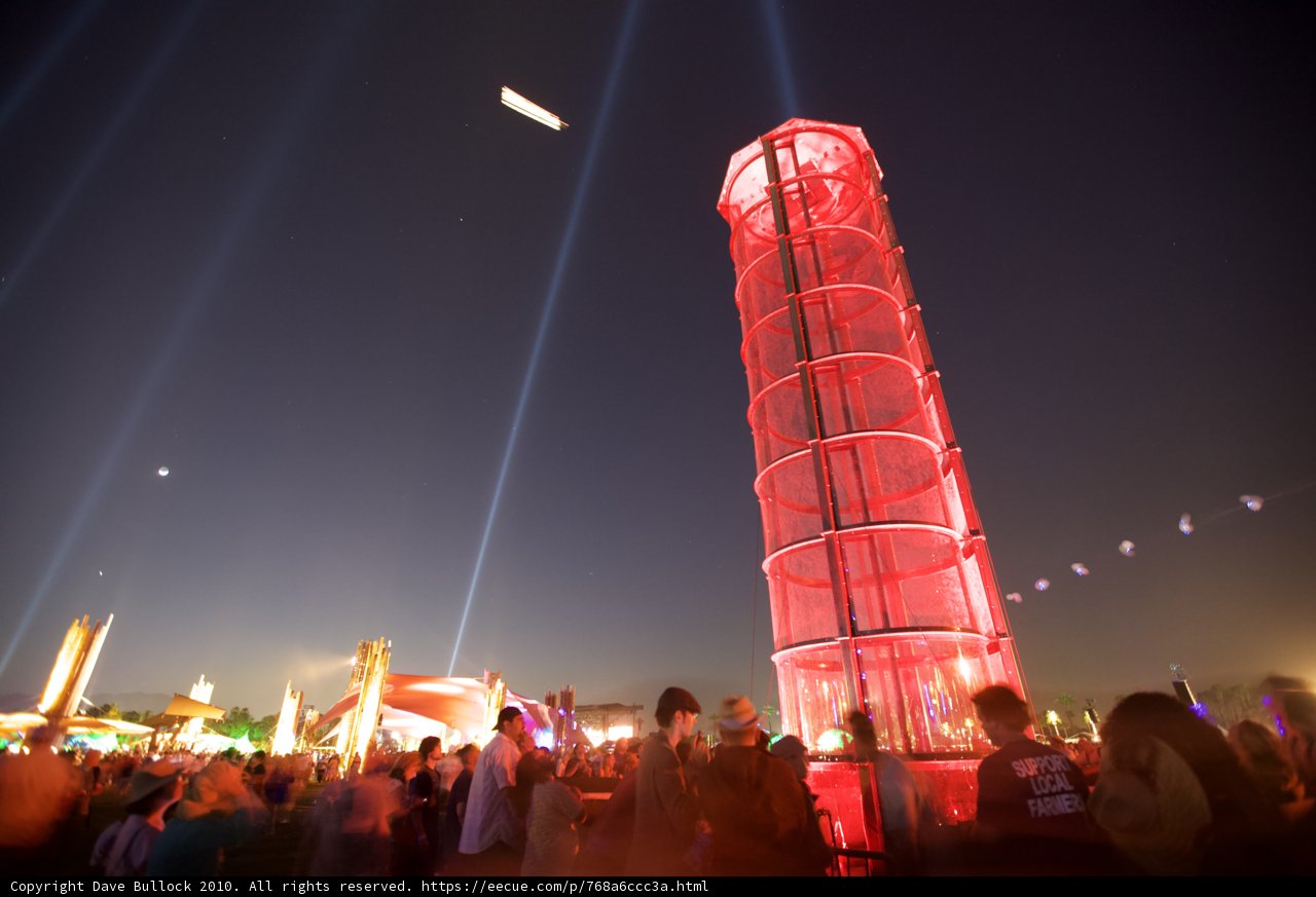 The Red Tower Illuminates the Night Sky