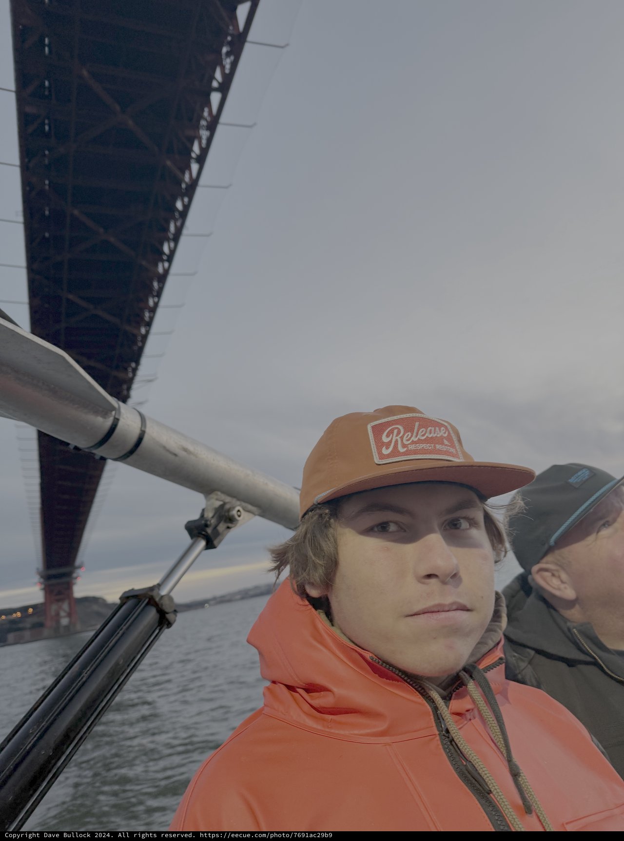 Boating Adventure Under Steel Bridge