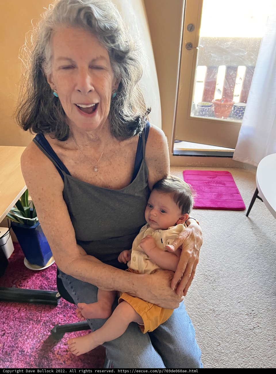Loving Grandmother with Grandchild on Lap