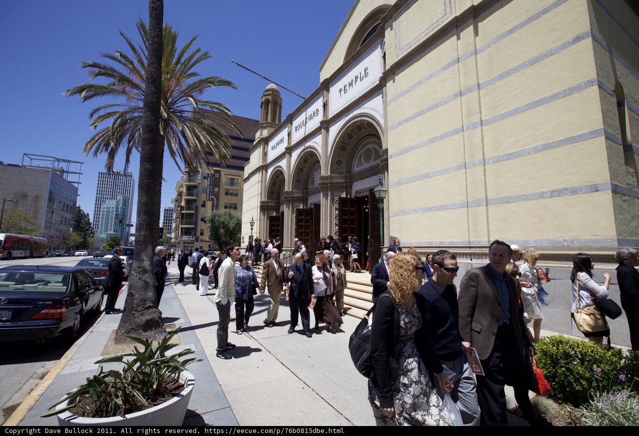 Crowded Sidewalk Outside Church during Ordination Ceremony