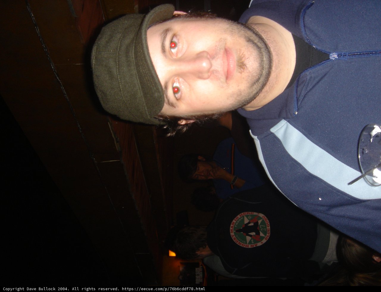 Blue-Shirted Man at the Pub