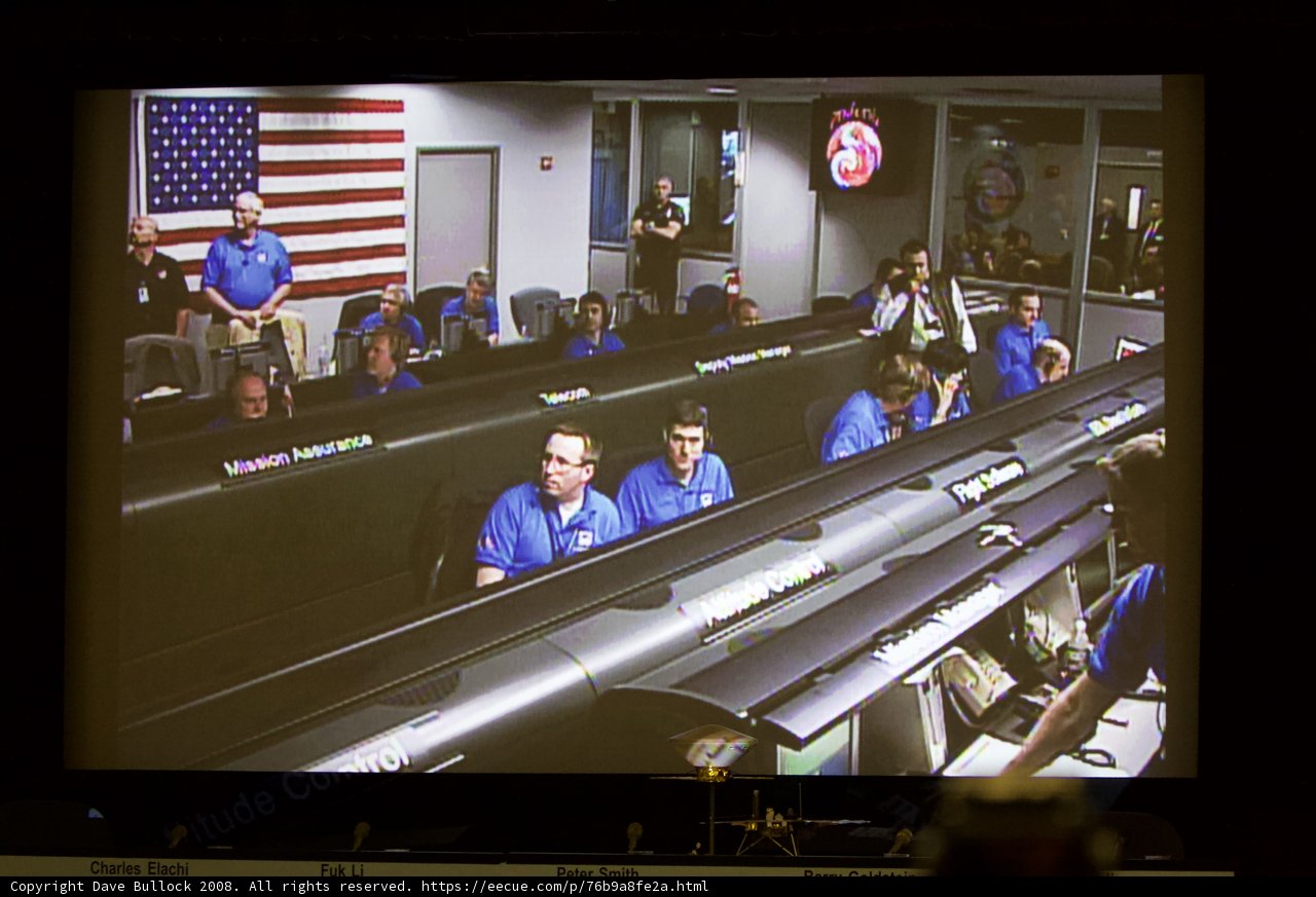 People in Space Station on Large Screen
