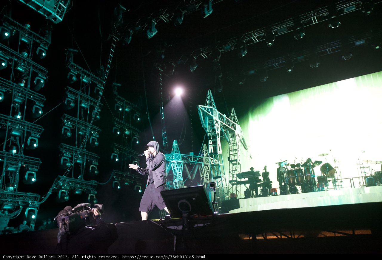 Spotlight on Stage: A Man with a Mic