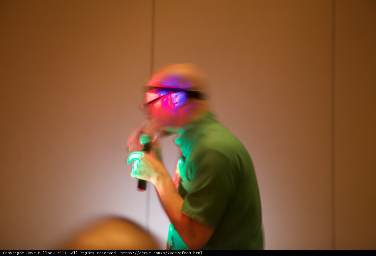 Green Shirted Man Takes the Mic