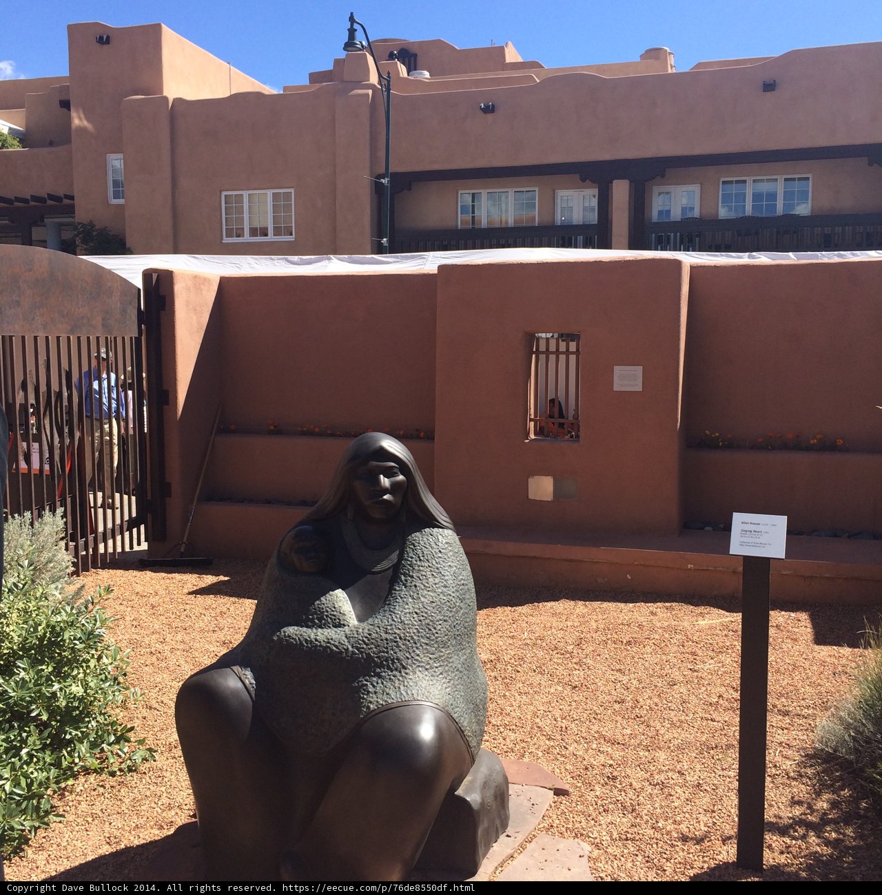 Statue of a Woman Amidst the Blue Skies of Santa Fe