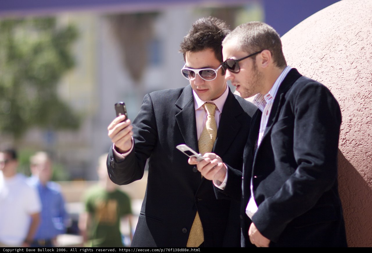 Businessmen Checking their Phones