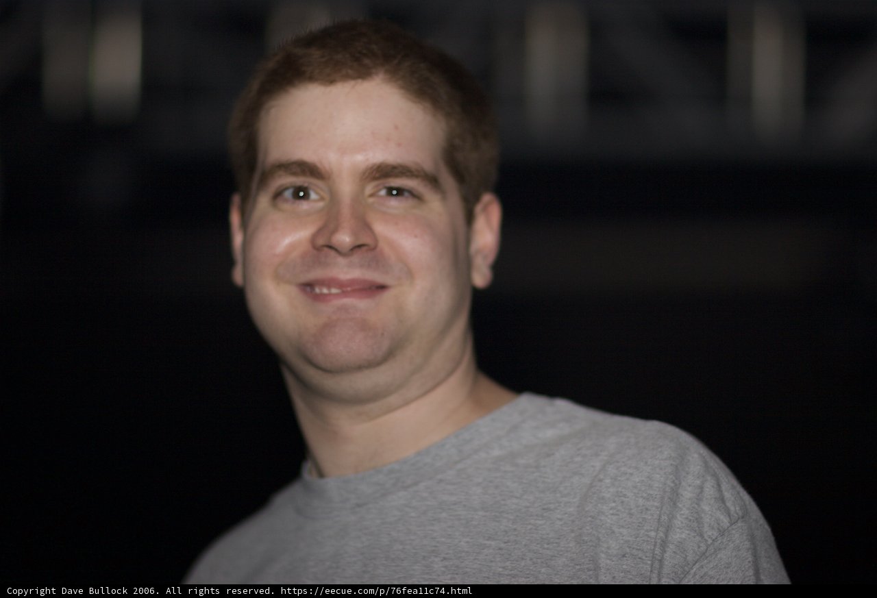 Grey shirt, big smile