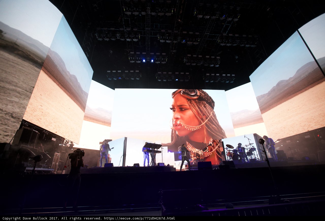 Solo Performance with Larger-Than-Life Backdrop