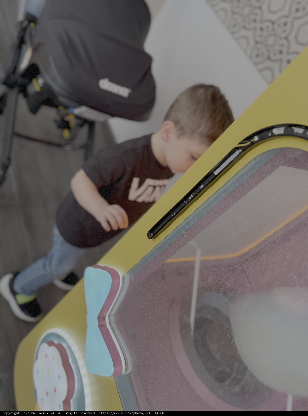 Child Playing Colorful Arcade Racing Game