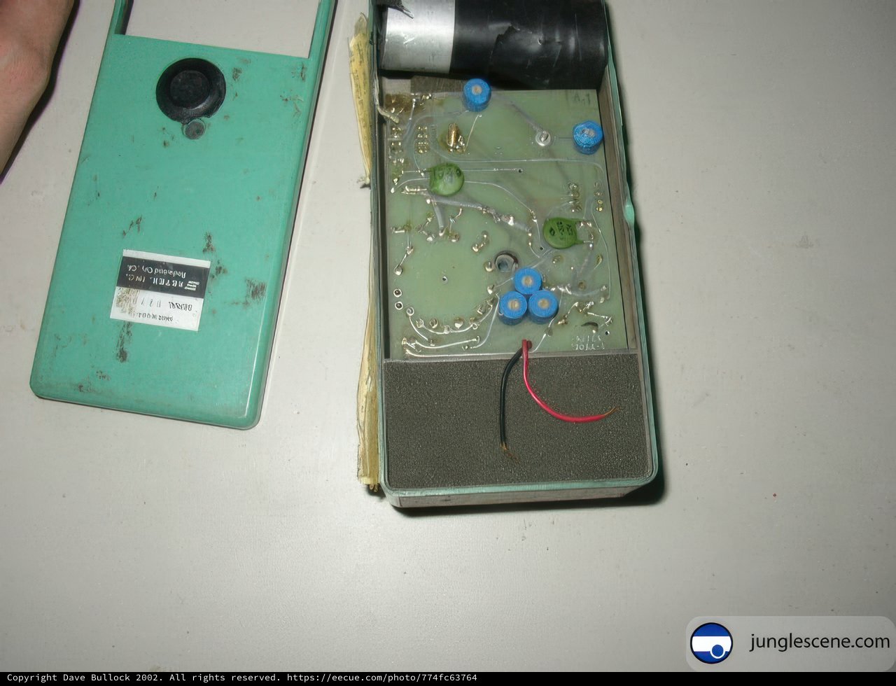 Vintage Electronic Device with Wires and Battery