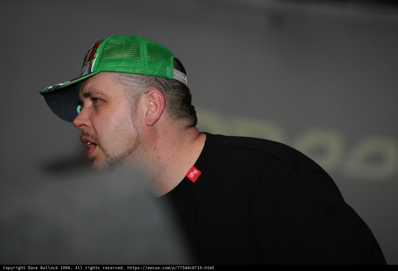 Green Hat, Black Shirt