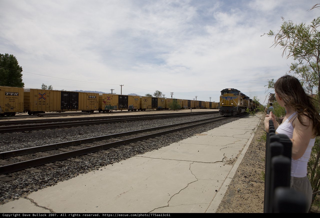 Young Girl Watches Union Pacific Freight Train Pass
