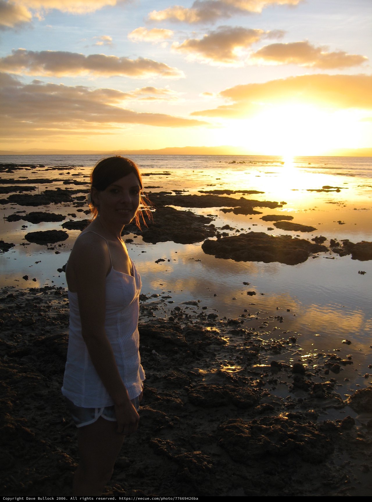 Golden Sunset Silhouette on Fiji's Rocky Shore