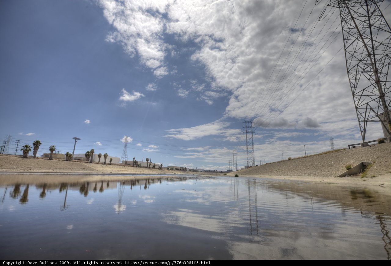 Desert Power Lines Stretch Across Blue Skies