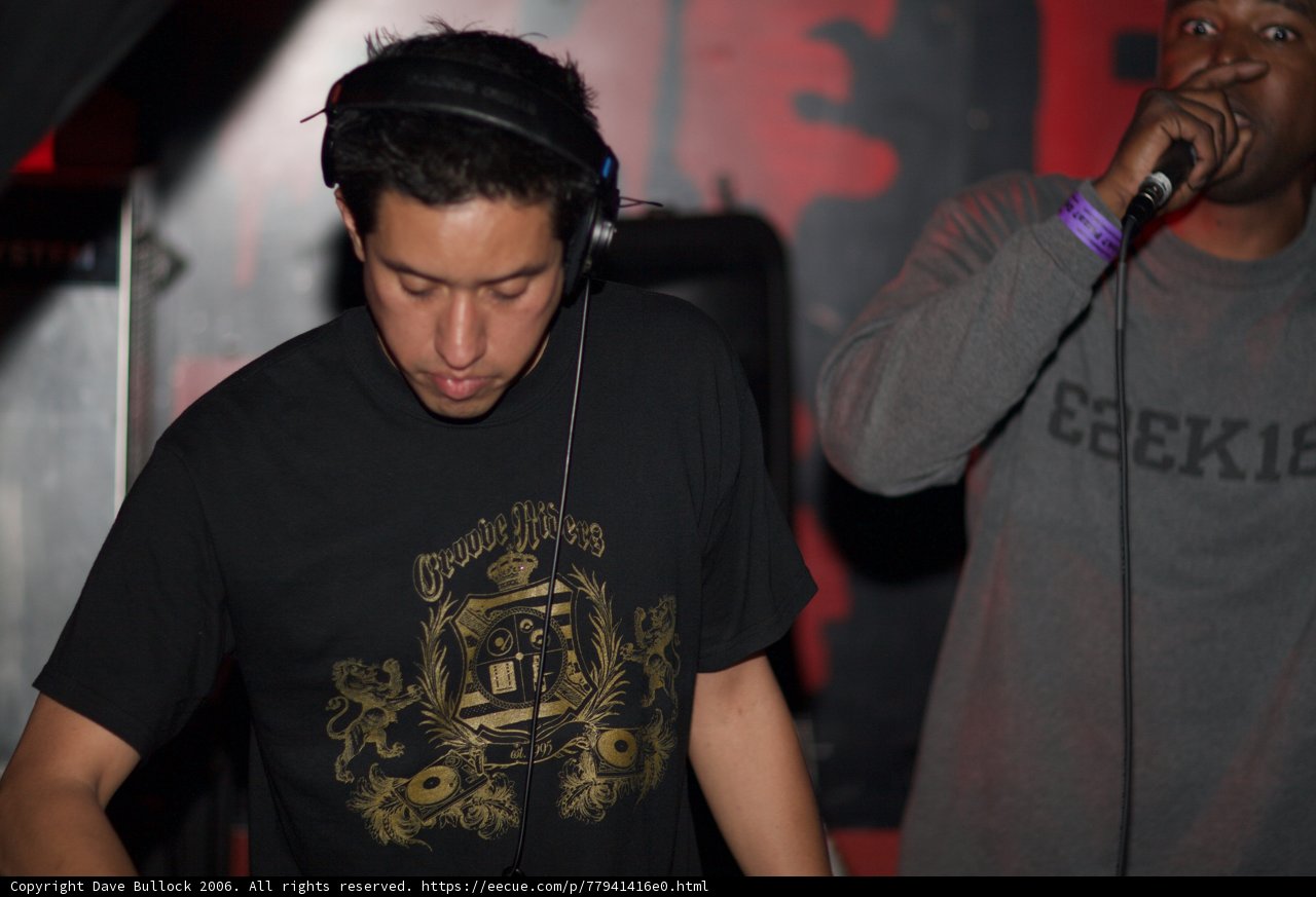 Entertainer on Stage with a Microphone and Headphones