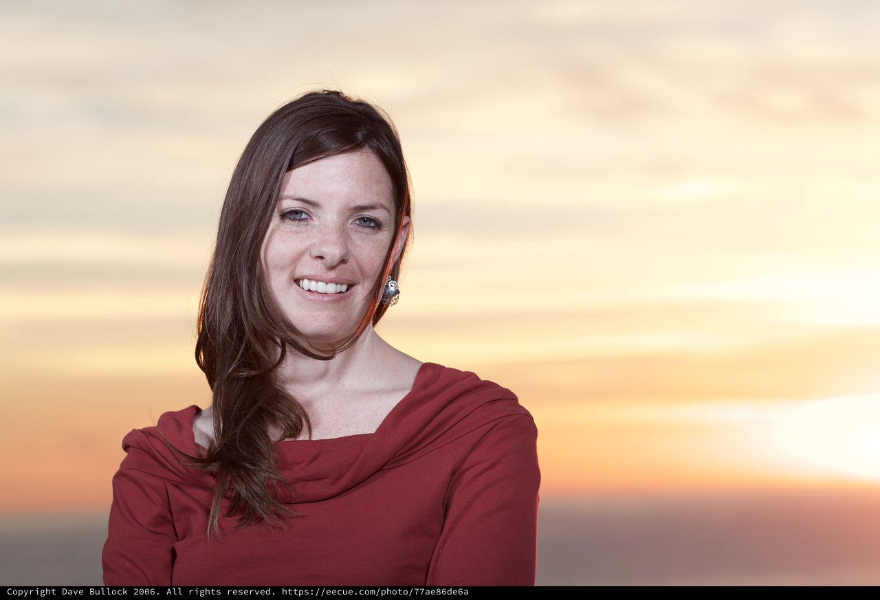 Smiling Woman Bathed in Golden Sunset Light