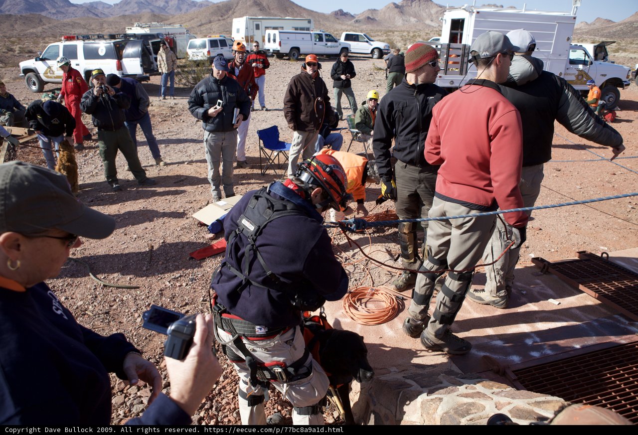 Mine Rescue Mission Team Gathers Around Fire Pit