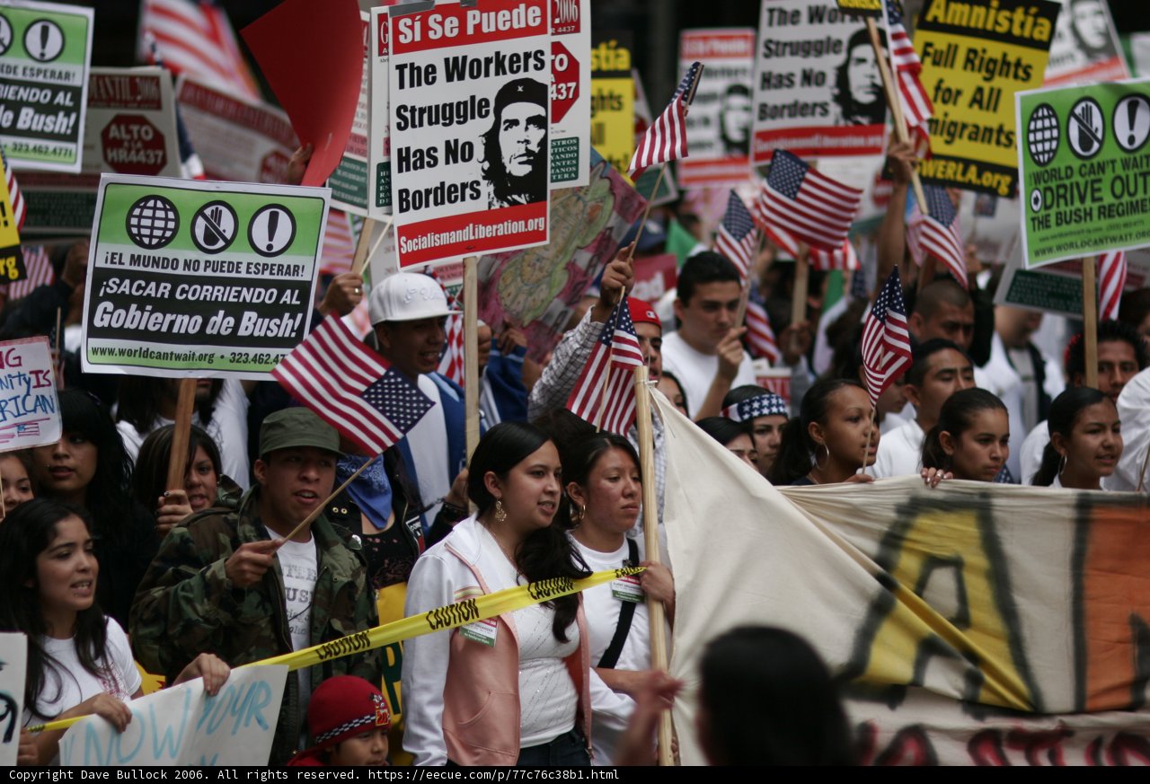 Student Protesters Wave Banners and Signs in Parade