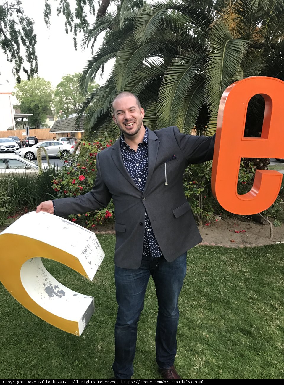 Standing next to the e Sign