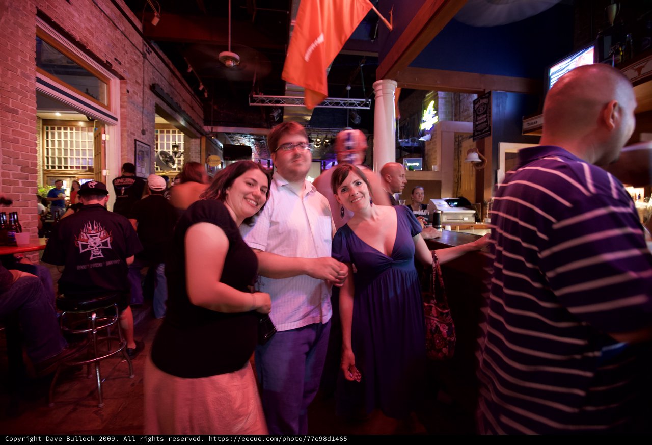 Friends Posing Together at Lively Austin Bar