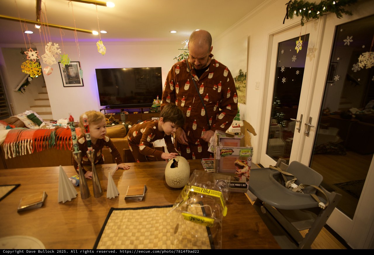 Father and Children Creating Christmas Crafts Together