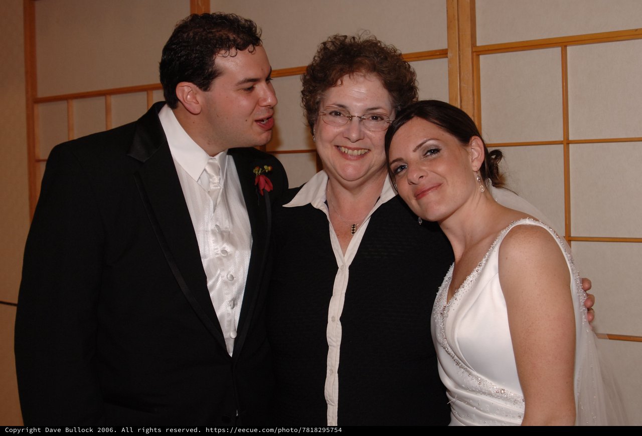 Bride and Groom Celebrate with Family at Wedding Reception