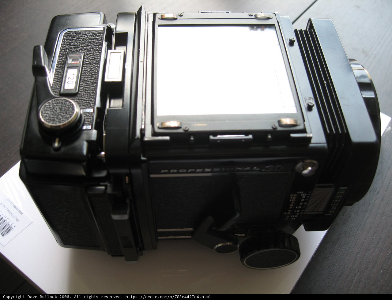 Black Camera on a White Surface