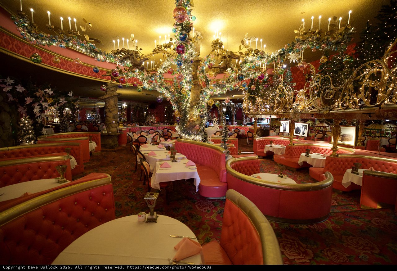 Opulent Crystal Chandelier in Lavish Pink Restaurant Interior