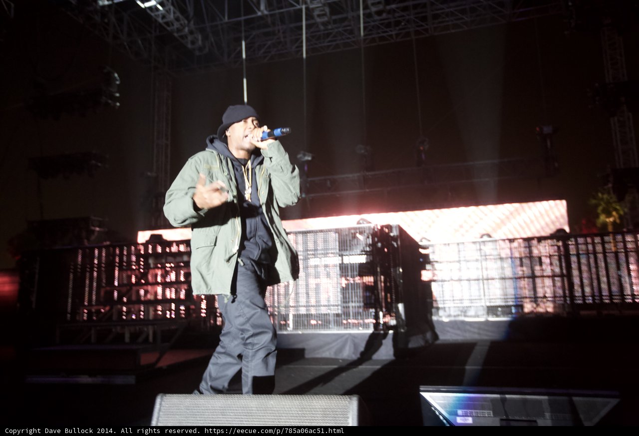 Green Jacketed Performer on Stage at Coachella