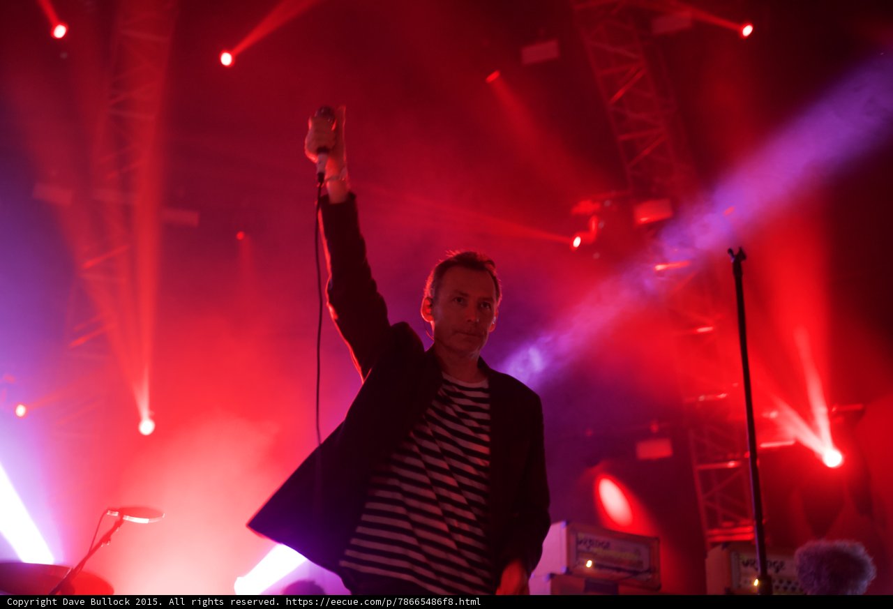 Singer Arm Raised Red Lighting