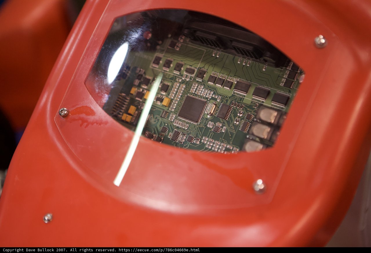 Red Device with Intricate Circuitry