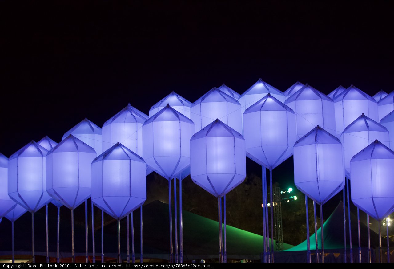 Illuminated Kites in the Urban Sky
