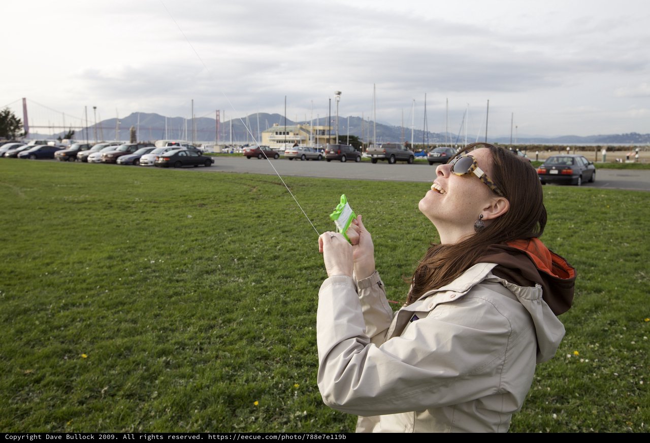 Joyful Kite Flying Near Golden Gate Bridge