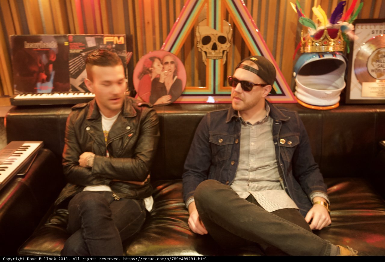 Musical Duo on a Cozy Couch