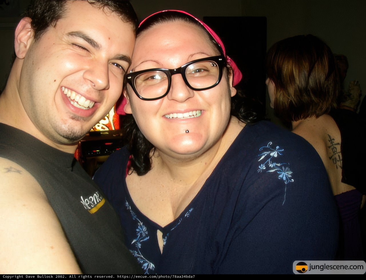 Smiling Duo in Trendy Glasses