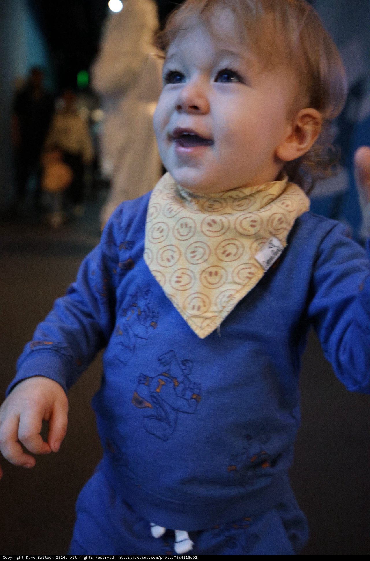 Toddler in Blue Shirt with Smiley Face Bandana