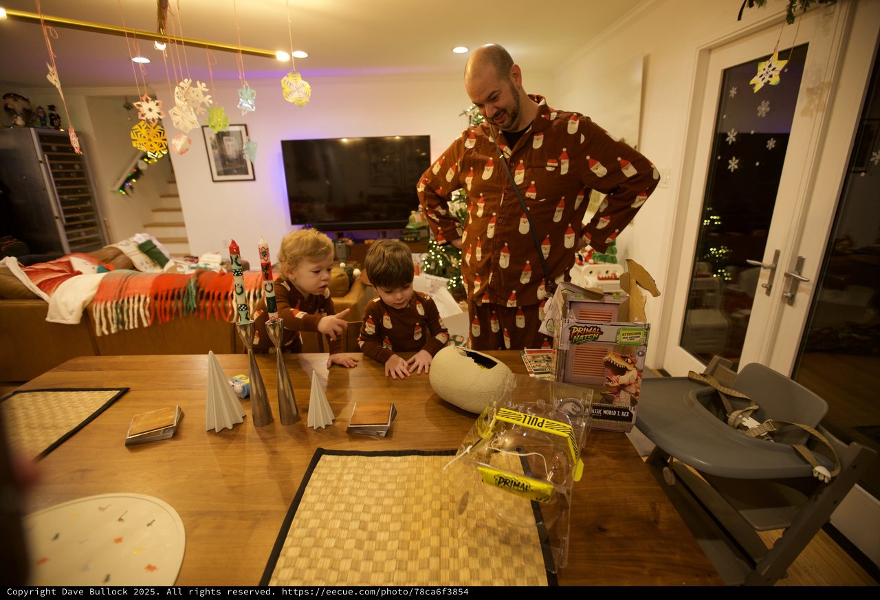 Family Christmas Morning Unwrapping Presents Together
