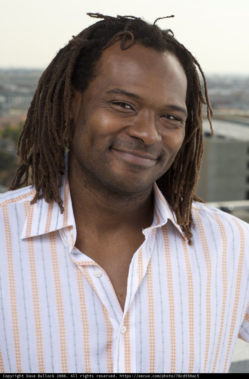 Dreadlocked James with a Beaming Smile