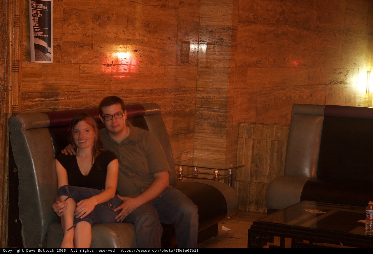 Couple Relaxing in Warm Upscale Lounge Interior